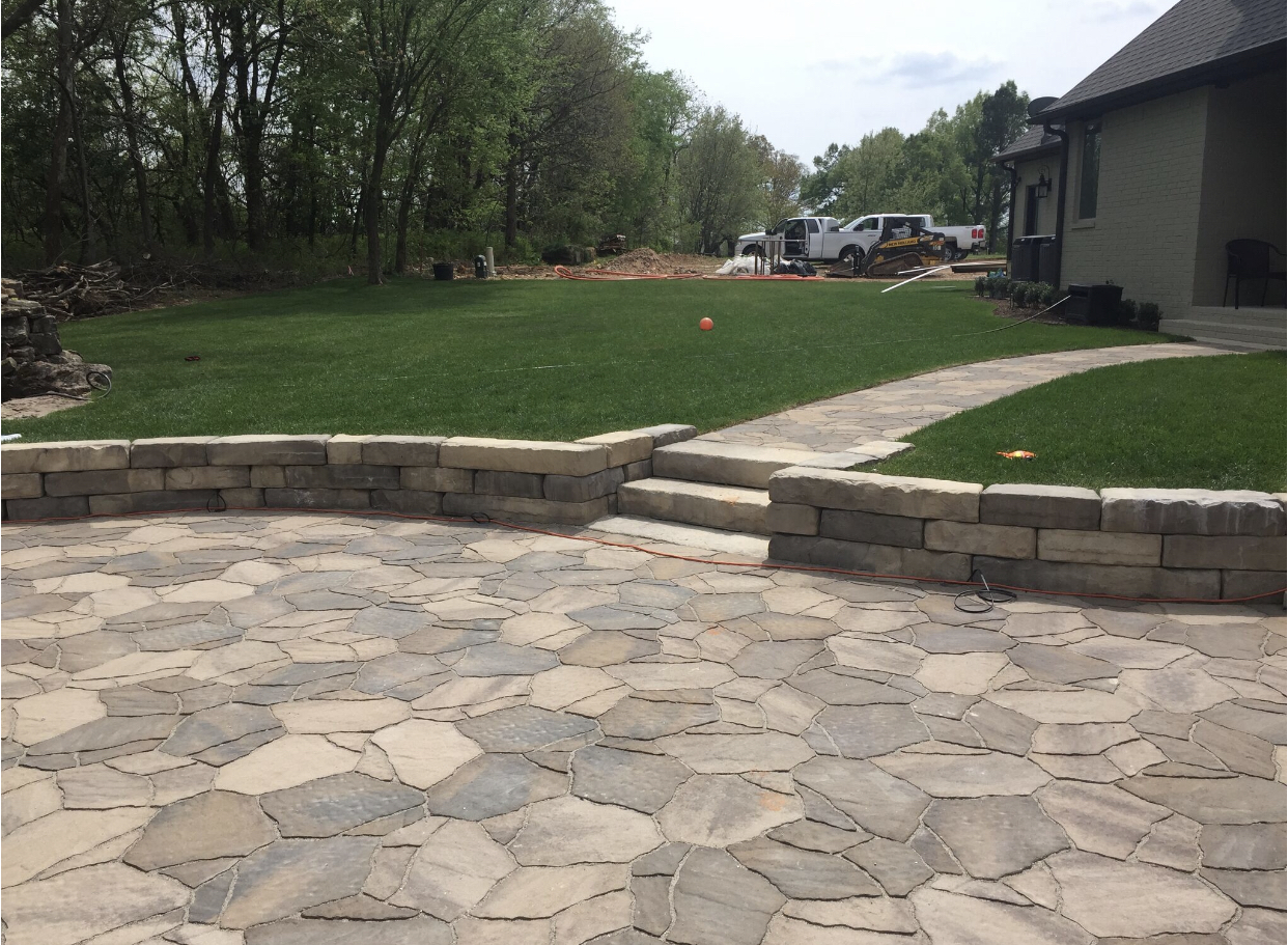 Retaining wall with patio
